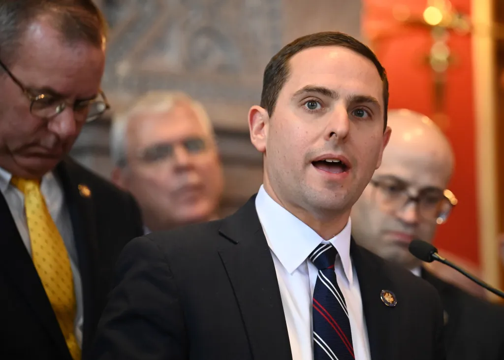 Assemblyman Matt Slater speaks at a news conference.