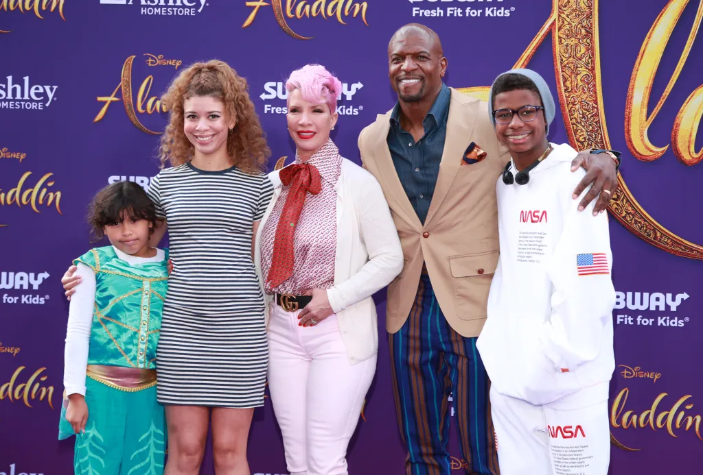 Rebecca King-Crews and Terry Crews with their family at the "Aladdin" premiere.