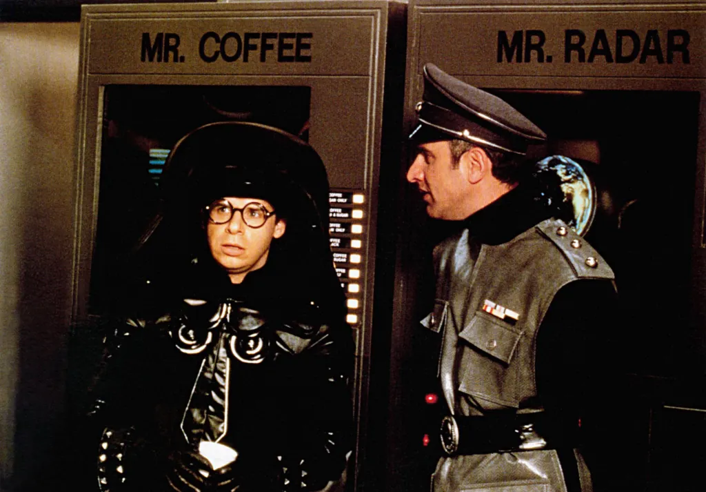 Rick Moranis as Dark Helmet and George Wyner as a soldier from the movie Spaceballs.