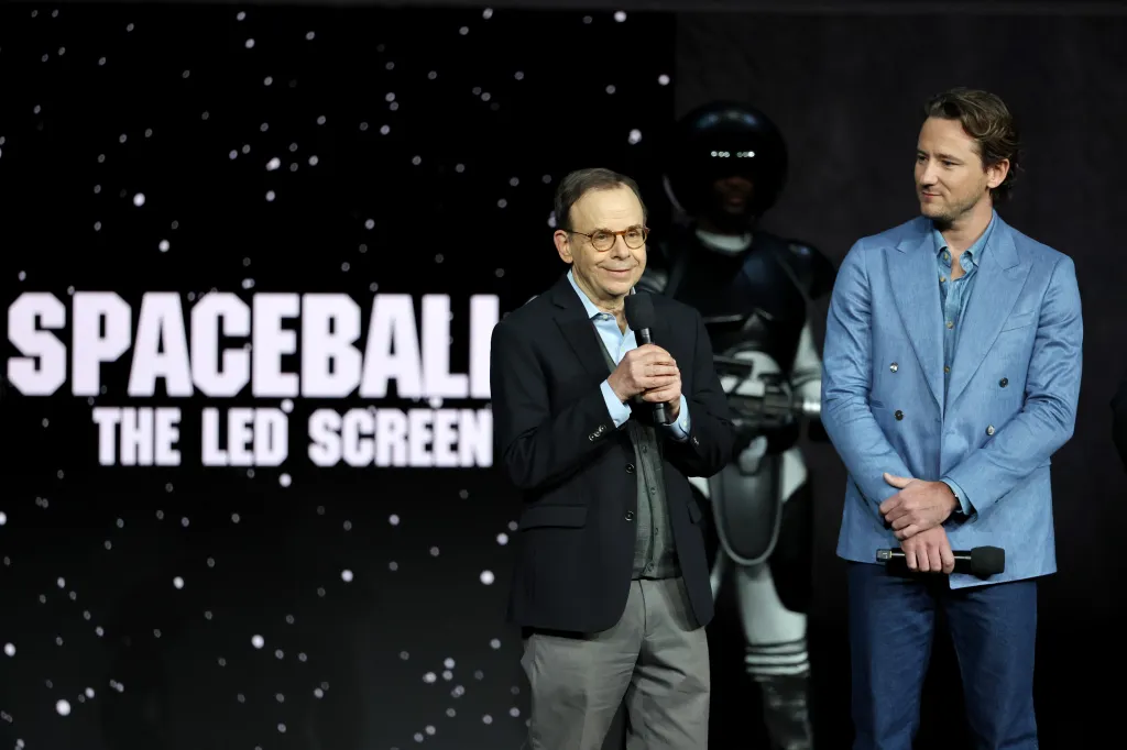 Rick Moranis and Lewis Pullman promoting "Spaceballs 2".