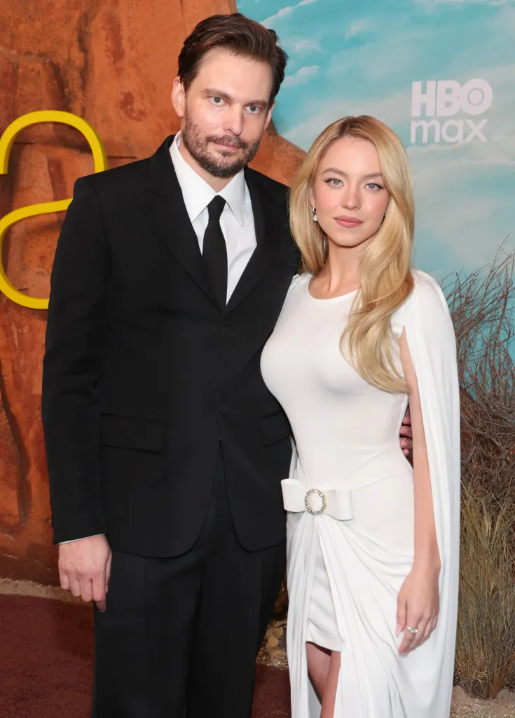 Sam Levinson and Sydney Sweeney posing at the "Euphoria" Season 3 Premiere.