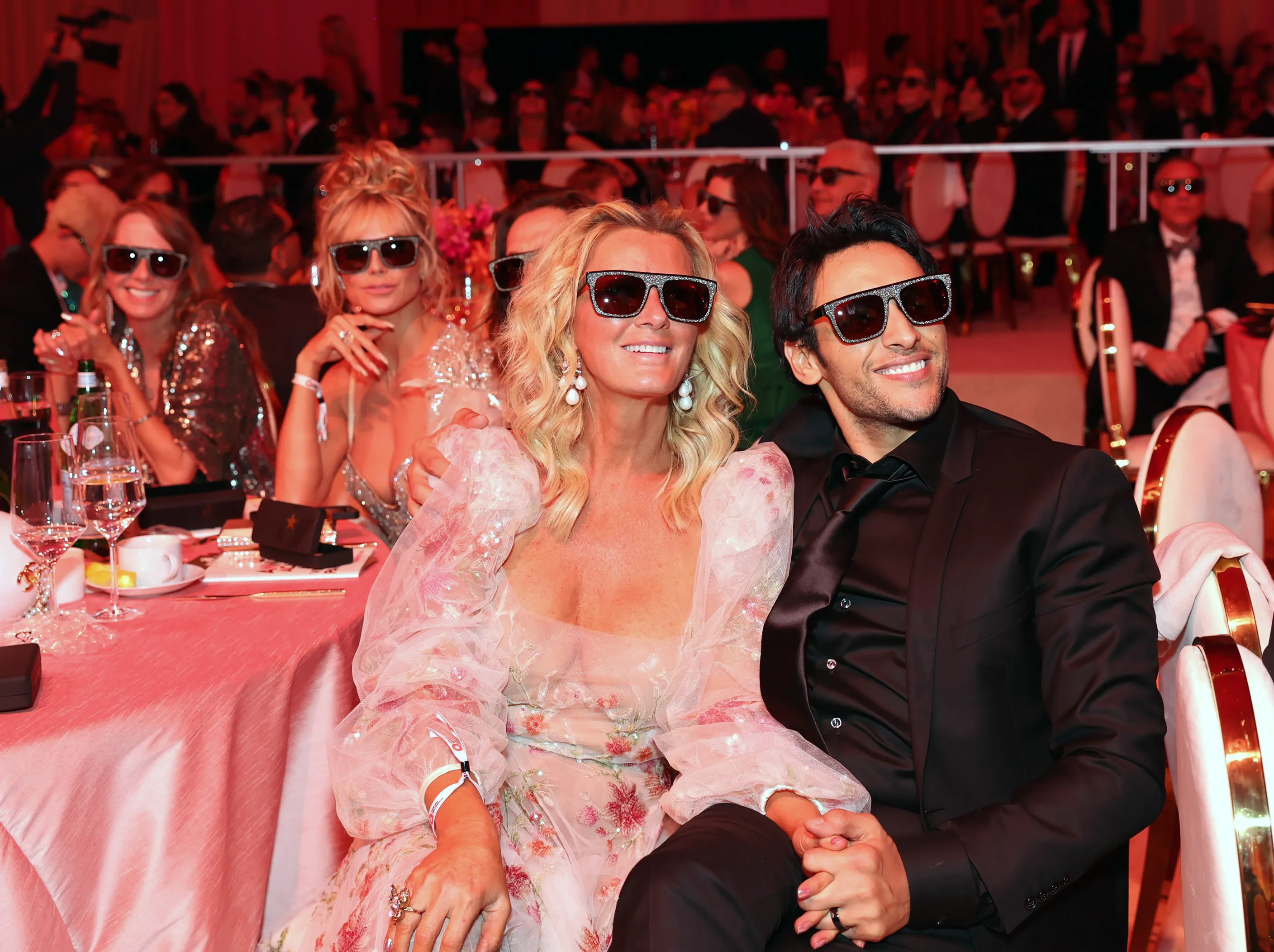 Sandra Lee and Ben Youcef sitting next to each other and holding hands at the Elton John AIDS Foundation's 30th Annual Academy Awards Viewing Party.