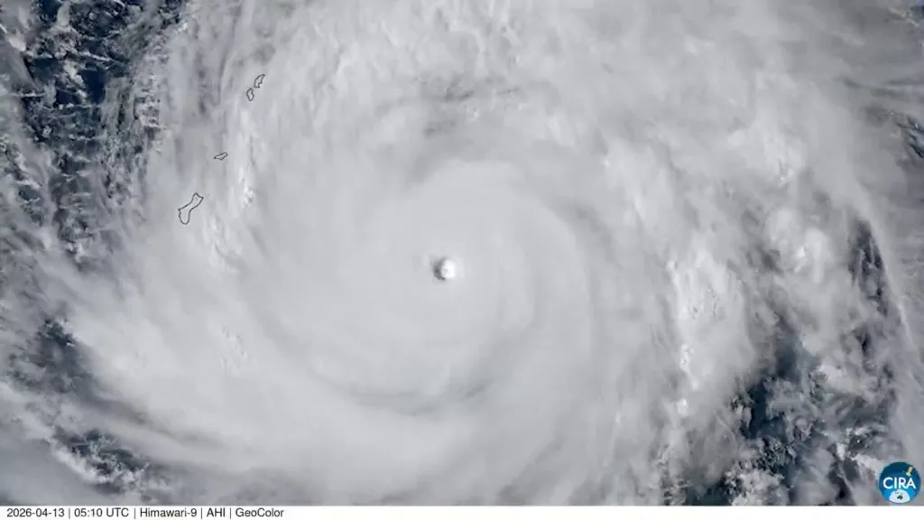 A satellite image of Super Typhoon Sinlaku approaching the Mariana Islands and Guam over the Pacific Ocean, in this handout picture taken from a video and released April 13, 2026. 