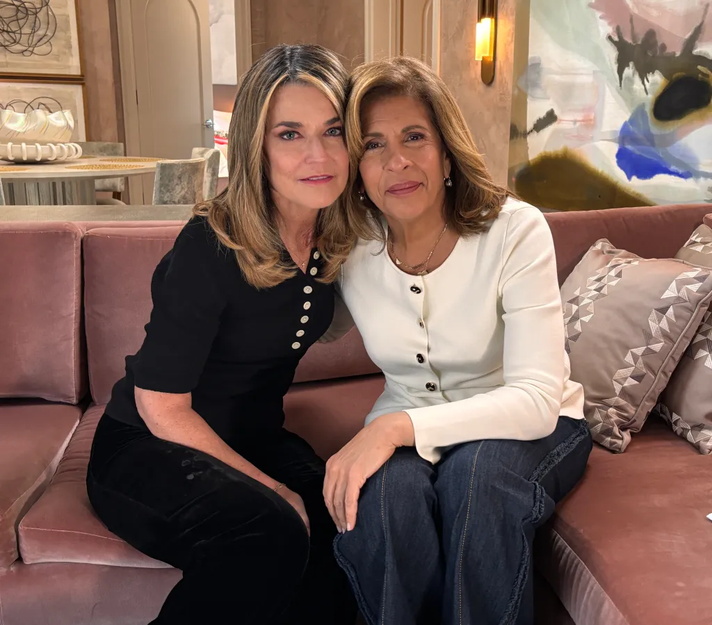 Savannah Guthrie and Hoda Kotb sitting on a pink couch.