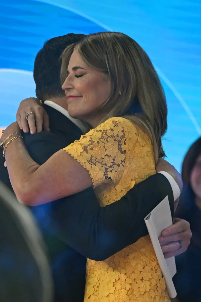 Savannah Guthrie hugging a man on the Today Show.