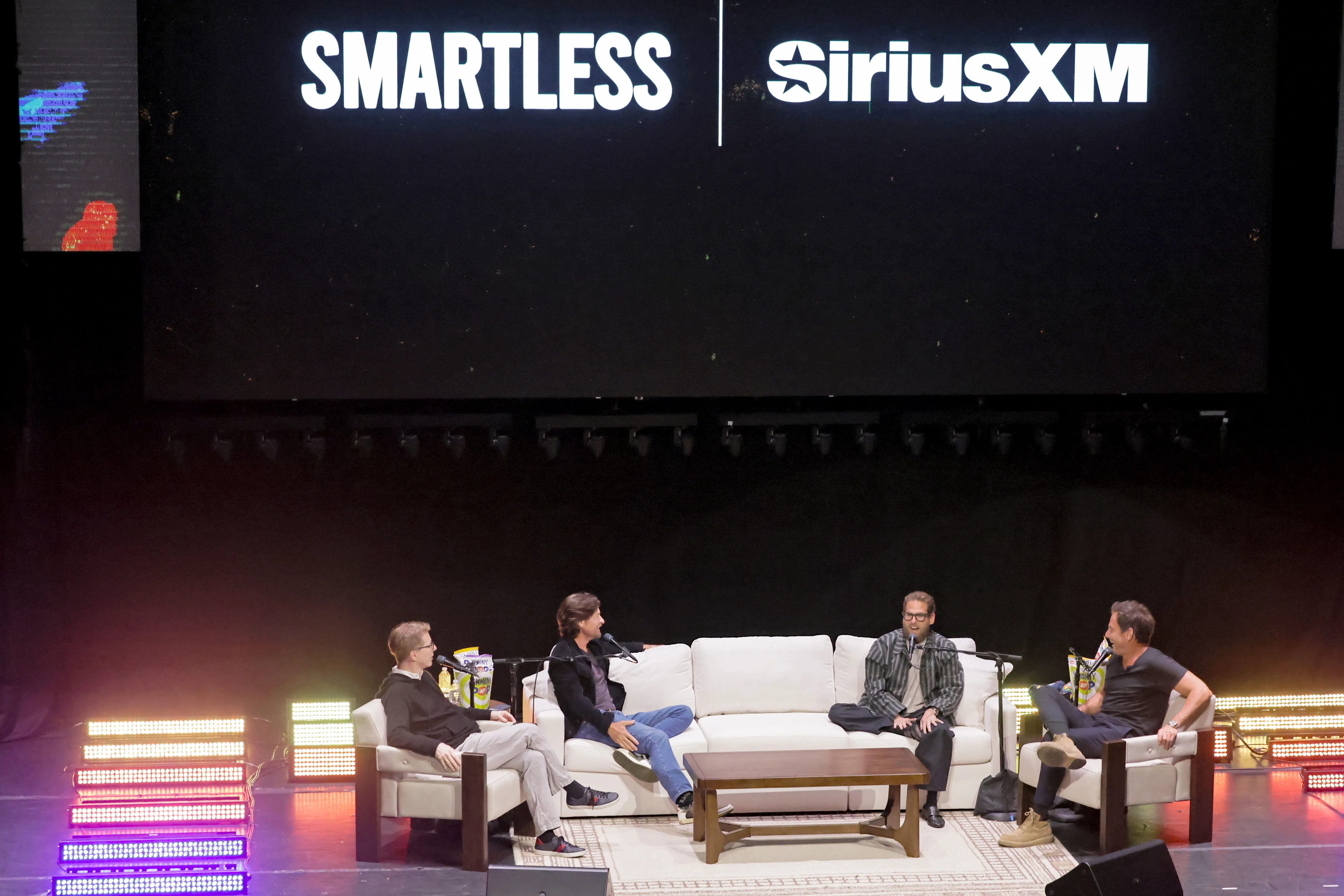 Sean Hayes, Jason Bateman, Jonah Hill, and Will Arnett speak onstage during the SiriusXM Presents SmartLess LIVE event.