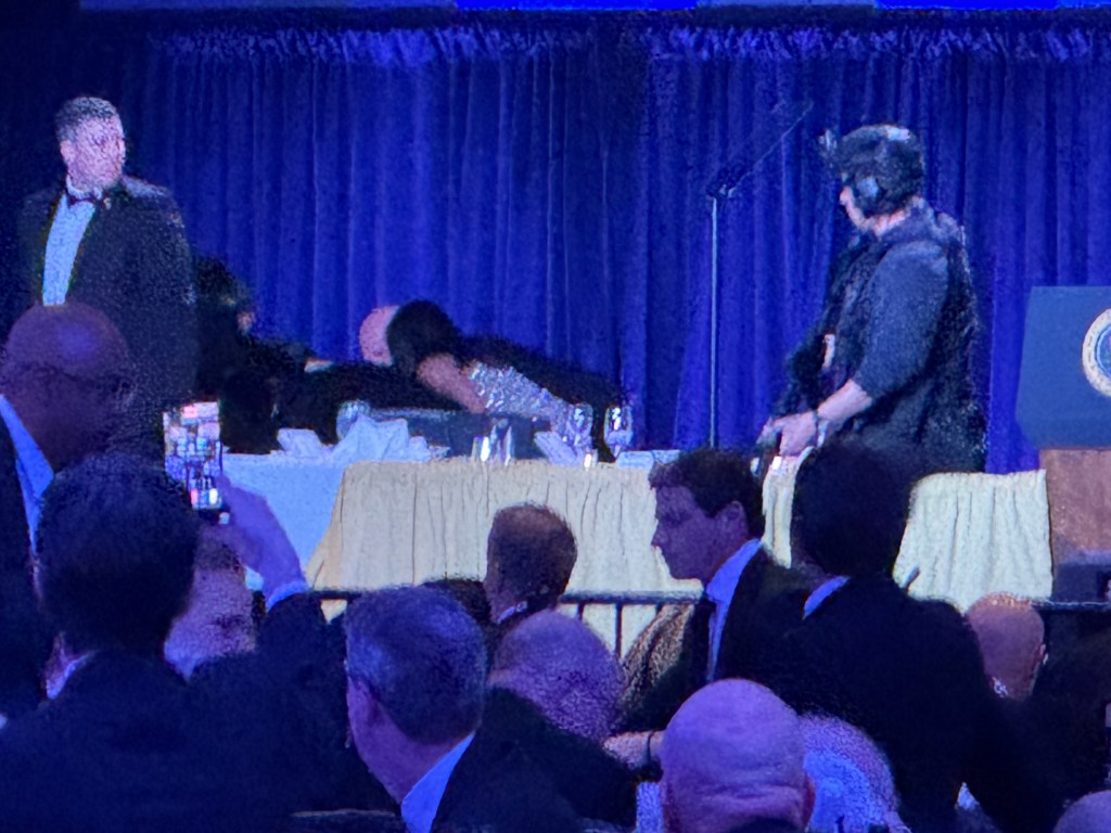 Secret Service agents responding during the White House Correspondents Dinner.