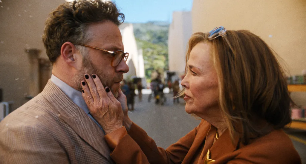Catherine O'Hara holding Seth Rogen's face in 