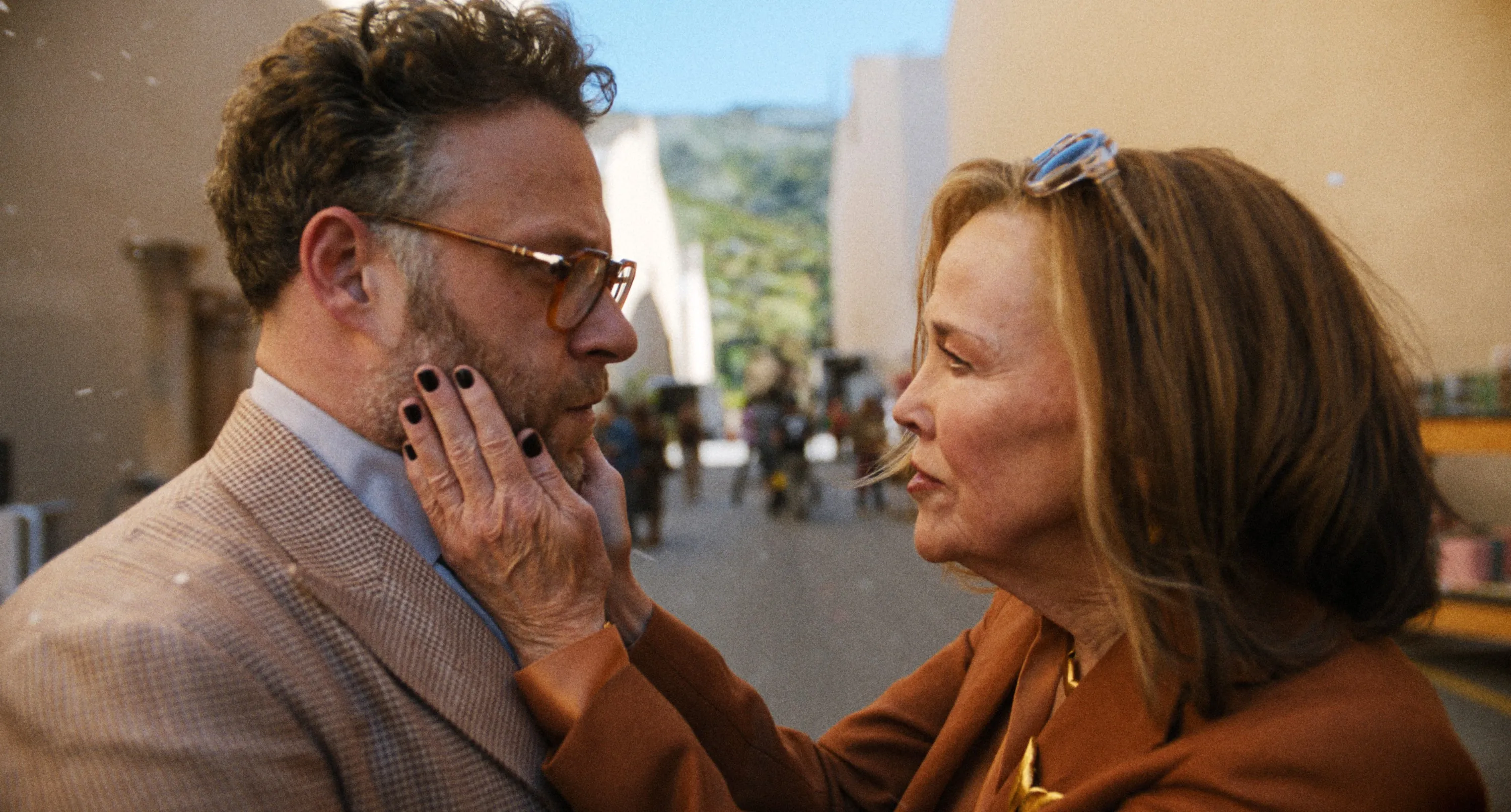 Catherine O'Hara cradles Seth Rogen's face in 
