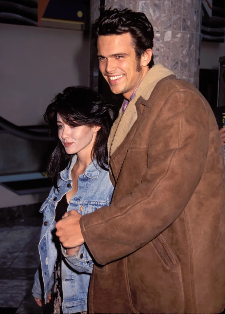 Shannen Doherty and Ashley Hamilton smiling at LAX.