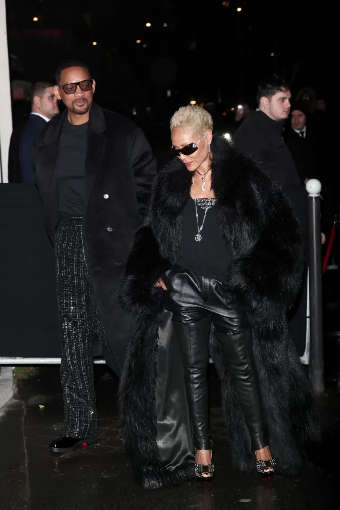 Will Smith and Jada Pinkett Smith posing at the Louboutin Capsule Collection By Jaden Smith Launch during Paris Fashion Week.