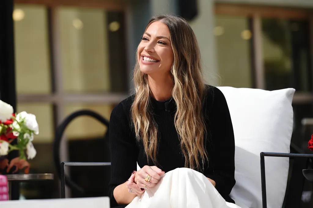 Stassi Schroeder speaking onstage during Fashion Island's 13th annual StyleWeekOC.