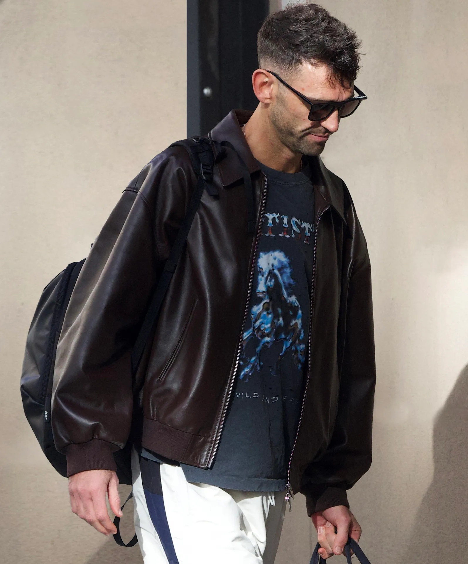 Carl Radke arriving at "Summer House" Season 10 reunion