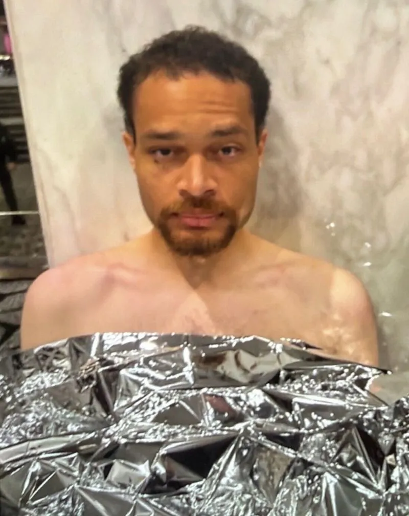 Cole Thomas Allen is photographed without a shirt after he was arrested for allegedly shooting inside the Washington Hilton hotel on April 25, 2026.