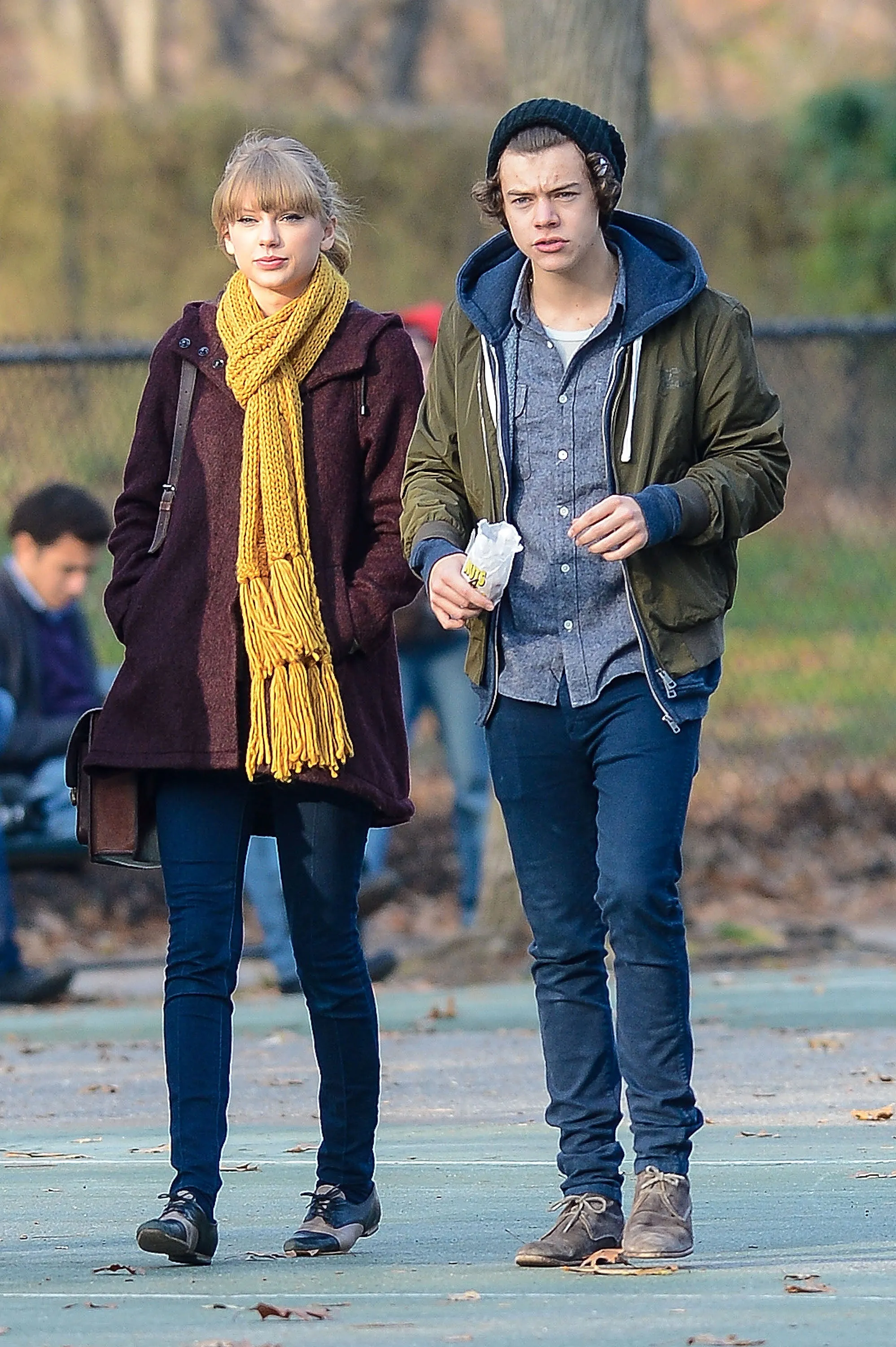 Taylor Swift and Harry Styles walking in Central Park.