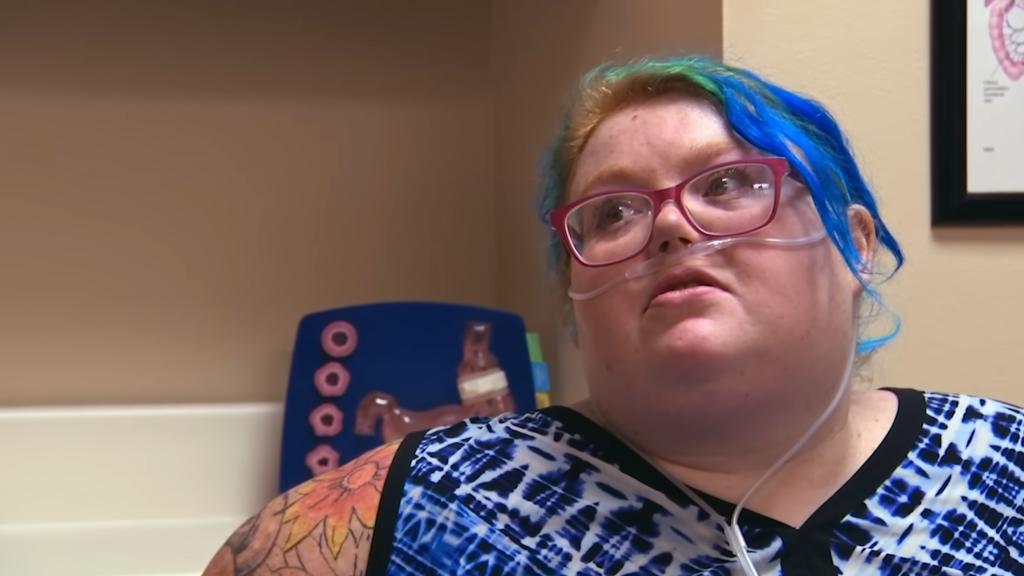 Dolly Martinez wearing glasses and a nasal cannula.