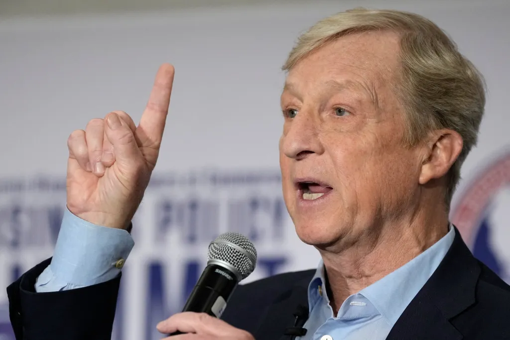 Tom Steyer speaking at a gubernatorial candidate forum in Sacramento.