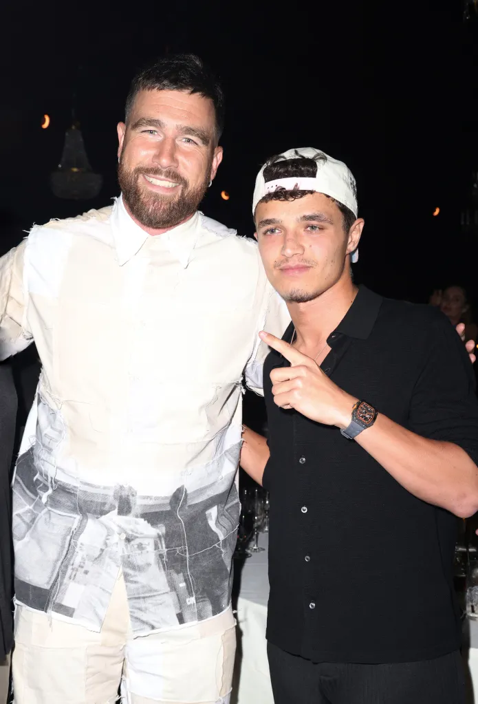 Travis Kelce and Lando Norris posing at an event.