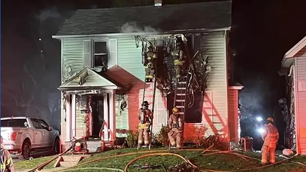 Firefighters battling a house fire in Toledo, Ohio.