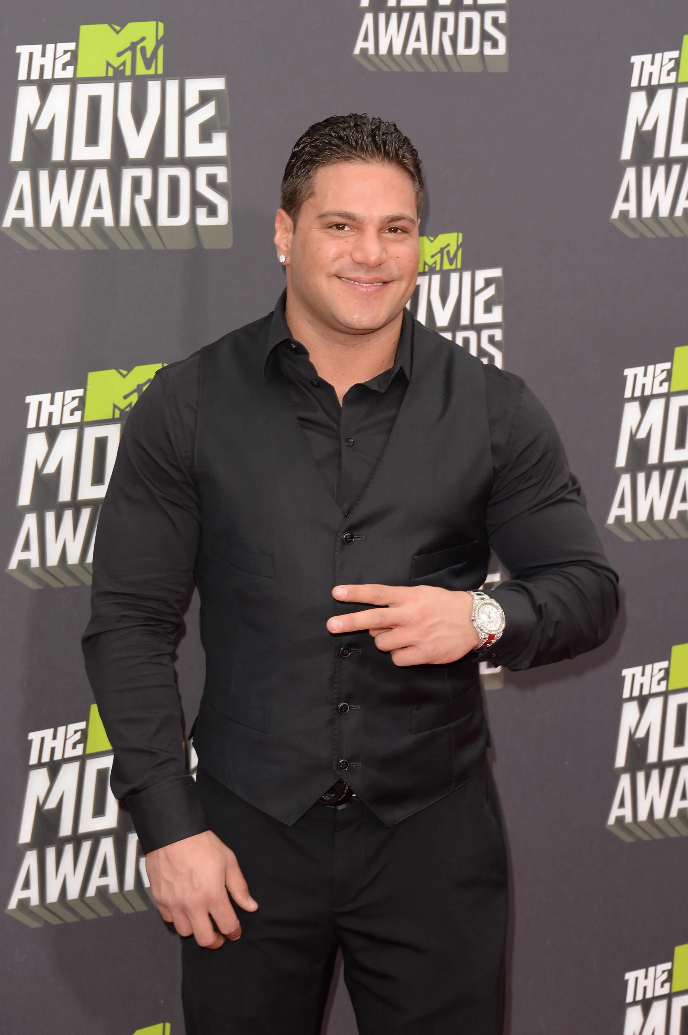Ronnie Ortiz-Magro poses on the red carpet at the MTV Movie Awards.