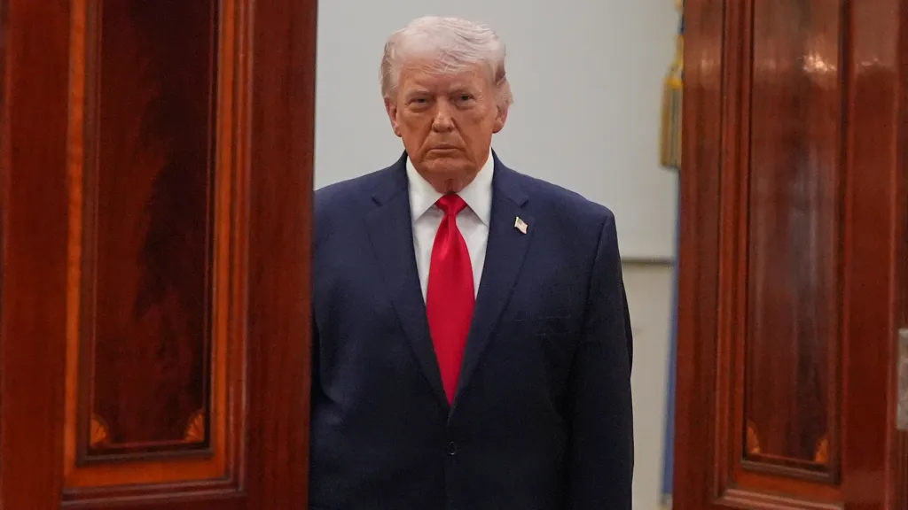 President Trump arriving to address the nation from the Cross Hall of the White House.