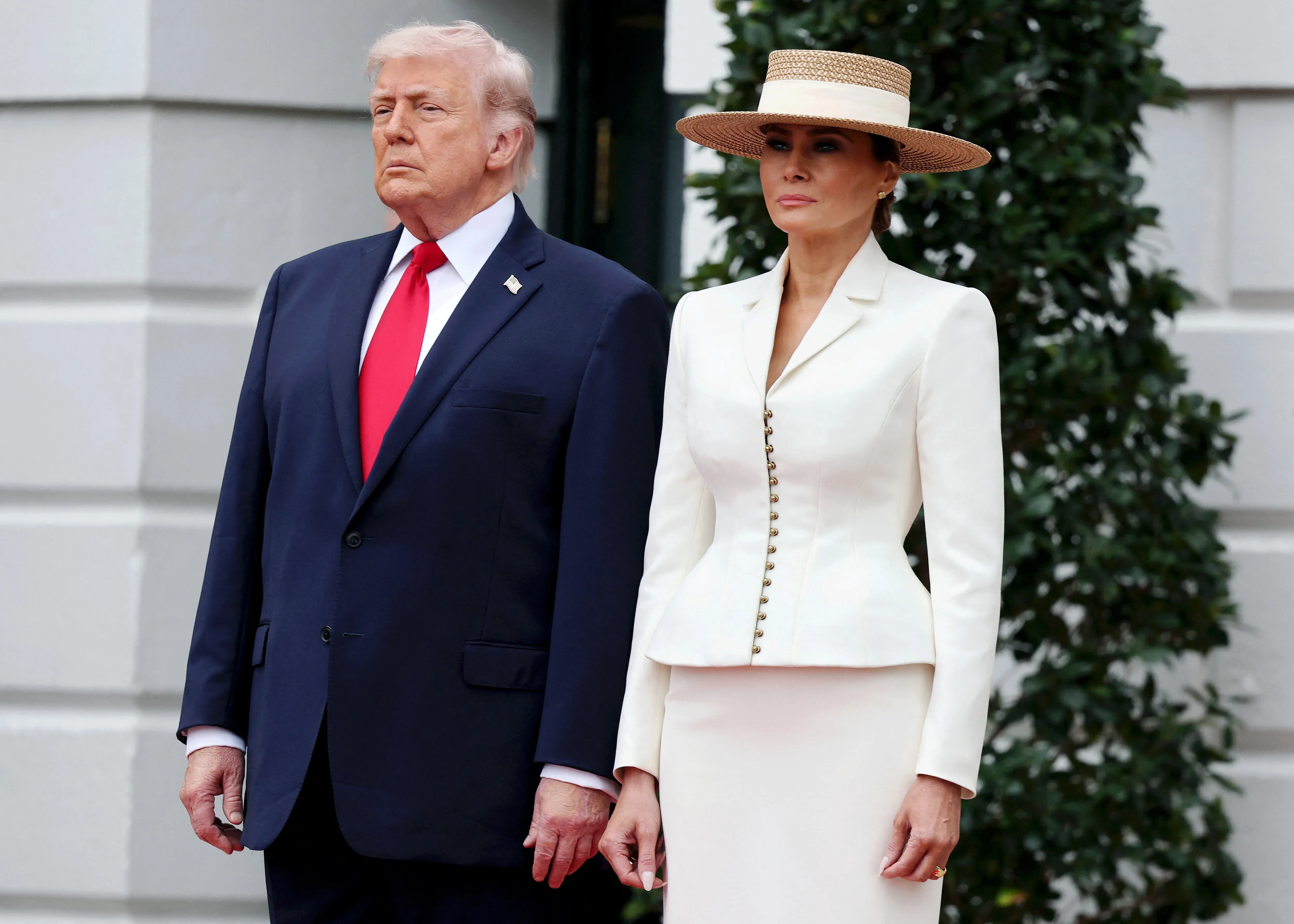 Donald Trump and Melania Trump standing side by side.