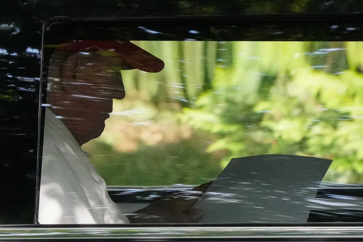 Trump caught gawking at woman while golfing with teen grandson: ‘She’s in great shape’