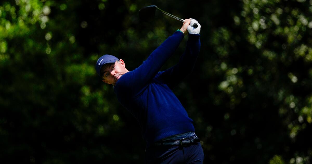 Defending champ Rory McIlroy excels in tough conditions to share Masters lead