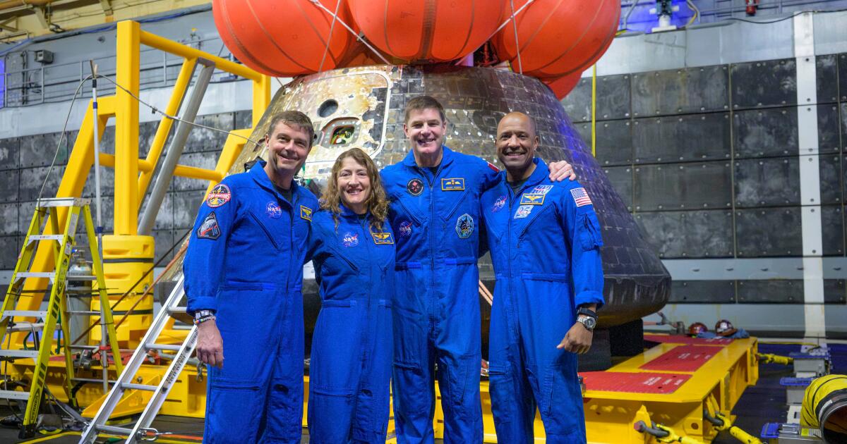 Artemis II’s moon-traveling astronauts return home to cheers after a record-breaking trip