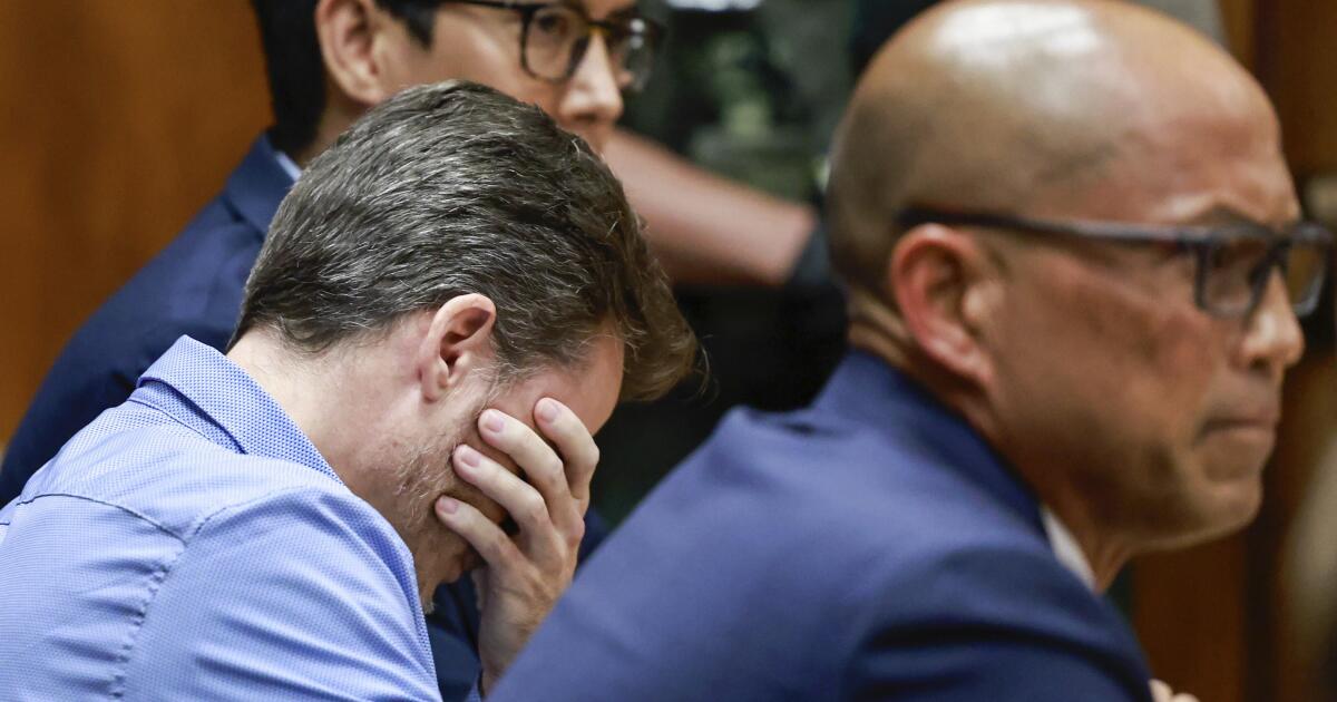 Hawaii doctor who prosecutors say tried to throw wife off cliff avoids murder conviction