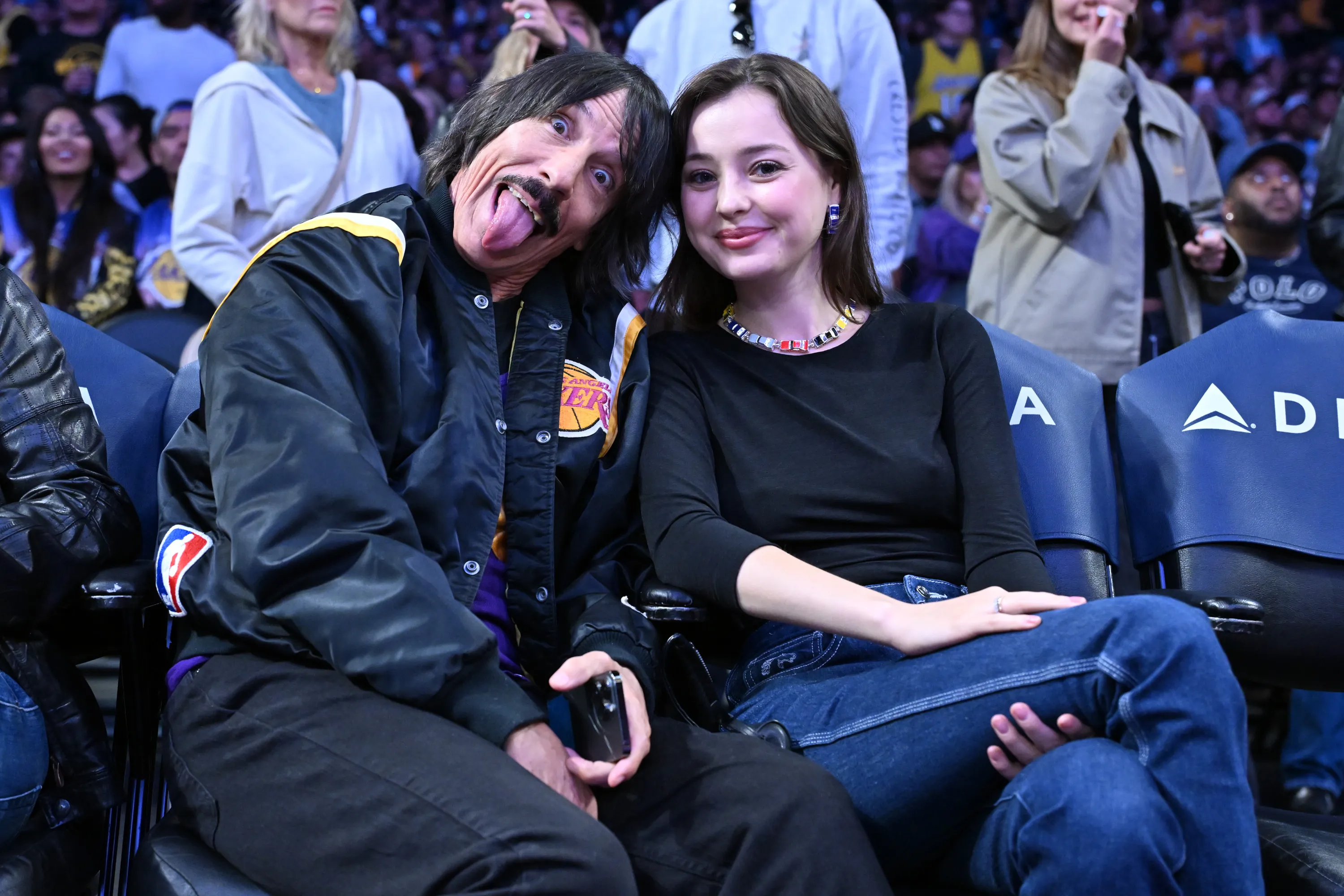Anthony Kiedis and Everly Bear Kiedis attend a Los Angeles Lakers game.