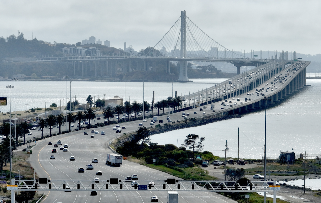 Vehicles cross the Bay Bridge in Oakland, California, during the afternoon commute.