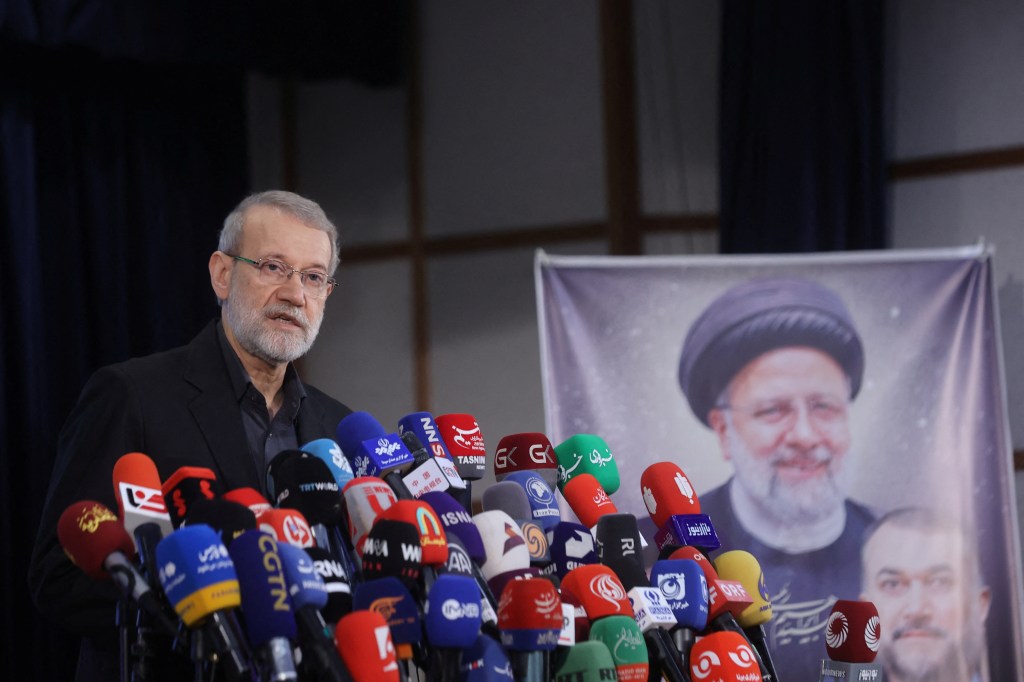 Ali Larijani speaks at a press conference after registering as a presidential candidate at the Interior Ministry in Tehran.