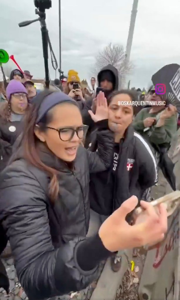 Hernandez was covering the protest for "F--k ICE Day" when she says demonstrators surrounded her after realizing she was affiliated with Turning Point USA.