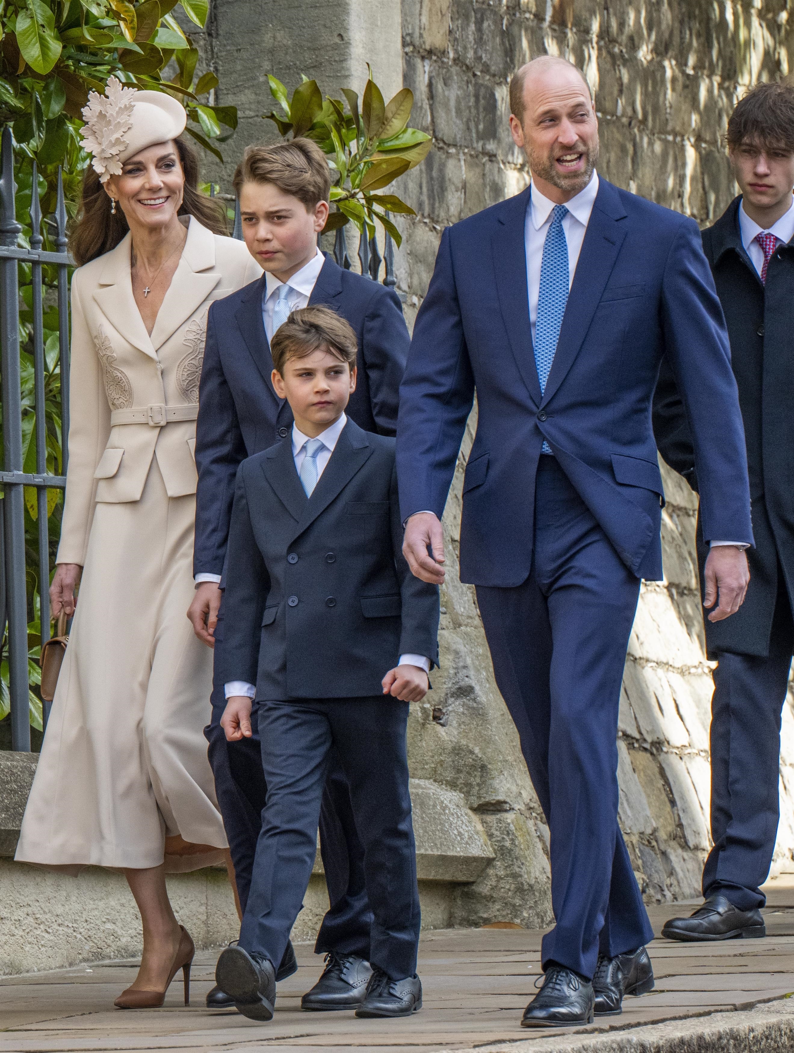 Catherine, Princess of Wales, Prince George, Prince Louis, and Prince William, Prince of Wales, departing the Easter Matins Service at St George’s Chapel.