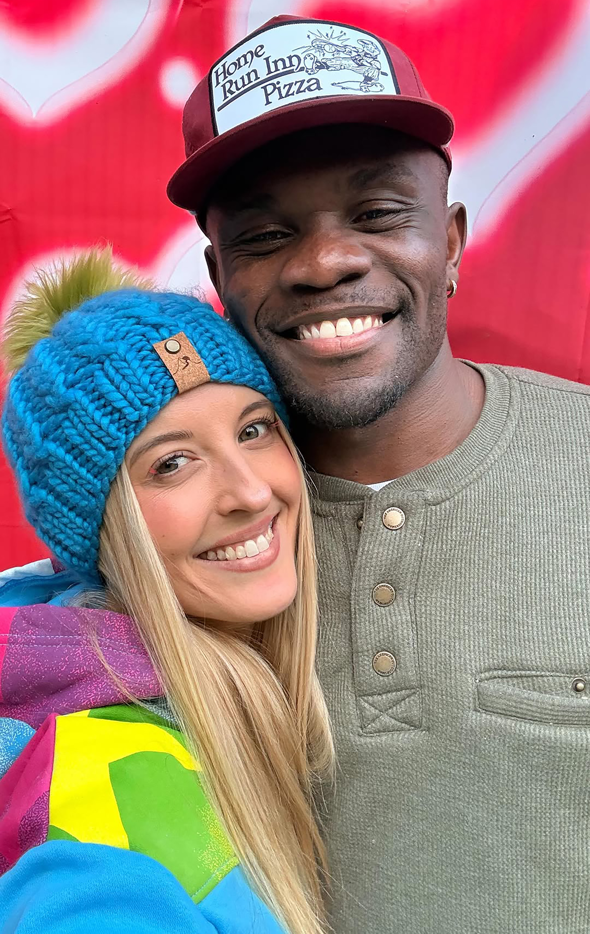 Chelsea Griffin and Kwame Appiah smiling together.
