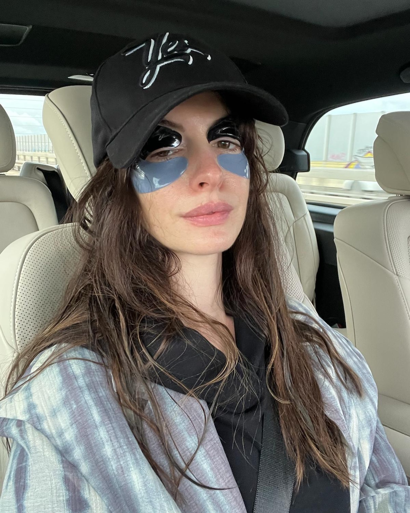 Anne Hathaway shares a peak into her beauty routine with her eye patches.