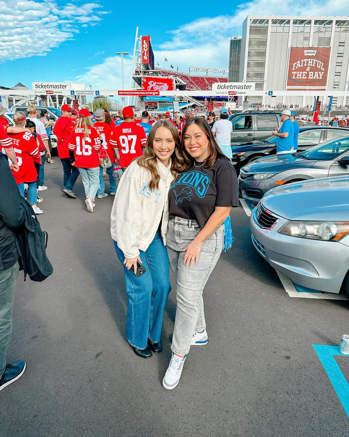 Two women, Alaina Marie and Hailie Jade, posing at the Levi's Stadium entrance.