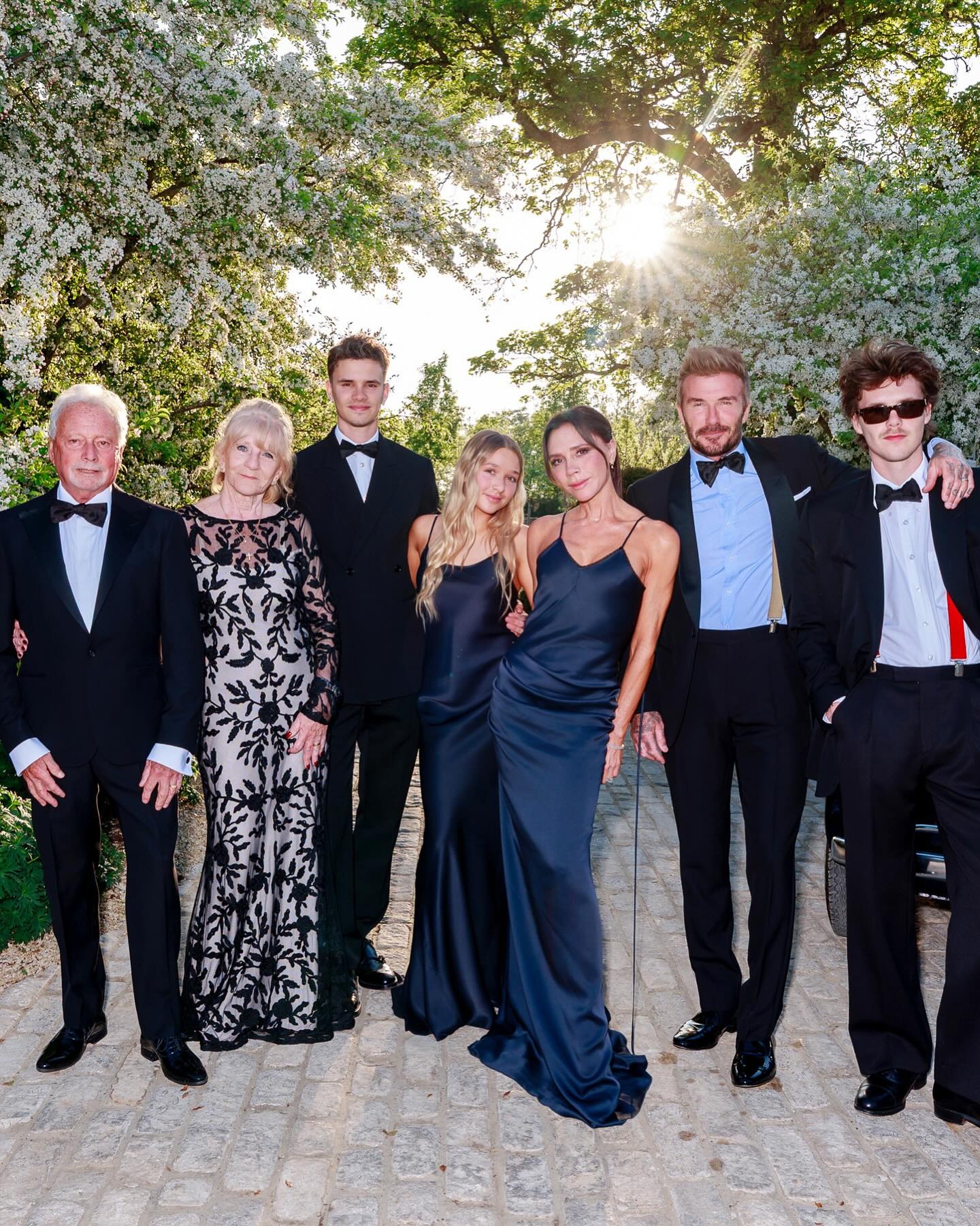 The Beckham family poses with David and Victoria Beckham's parents.