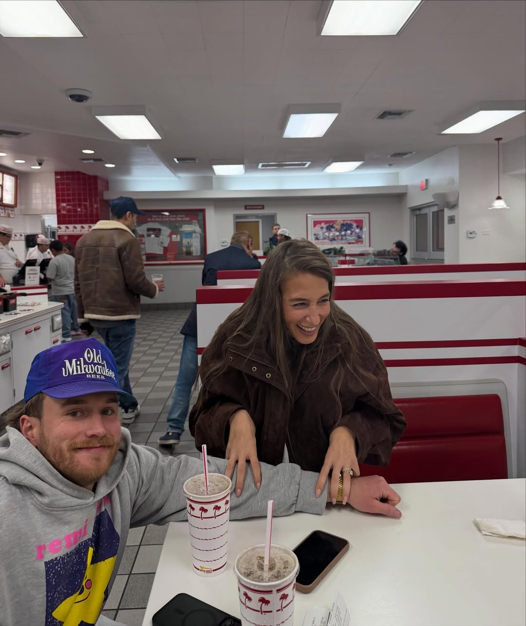 West Wilson and Amanda Batula at a fast-food restaurant.
