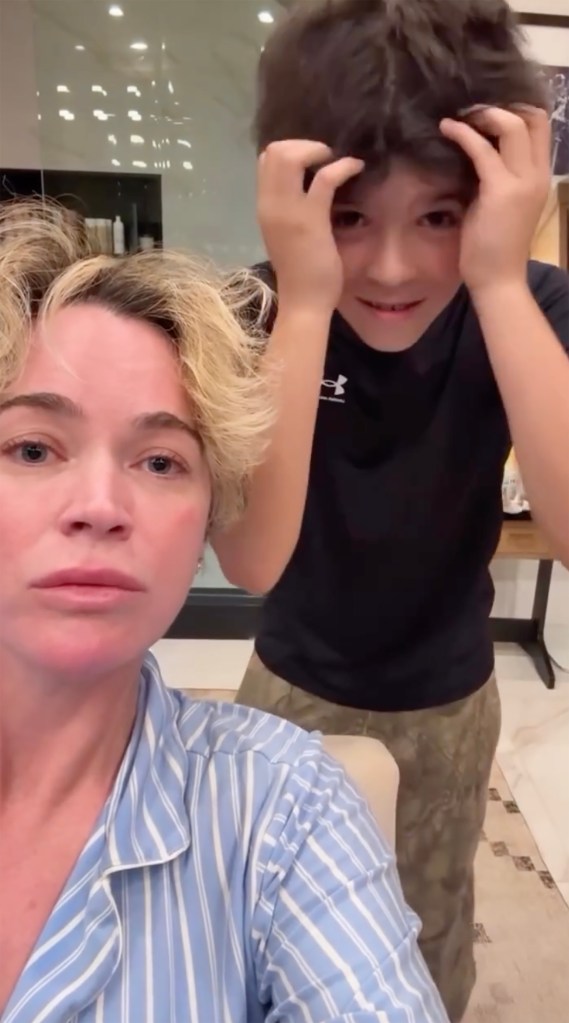 Teddi Mellencamp with a child behind her, playfully messing up their hair.