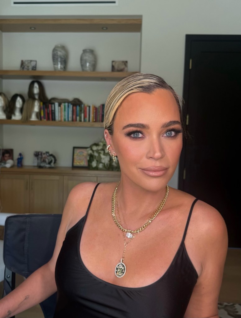 Teddi Mellencamp in a black camisole with layered gold necklaces.