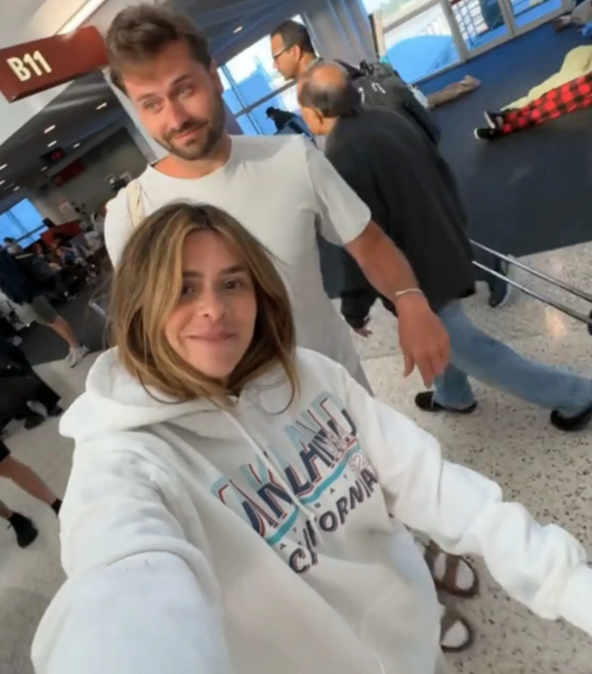 Taylor Frankie Paul and Dakota Mortensen at an airport.