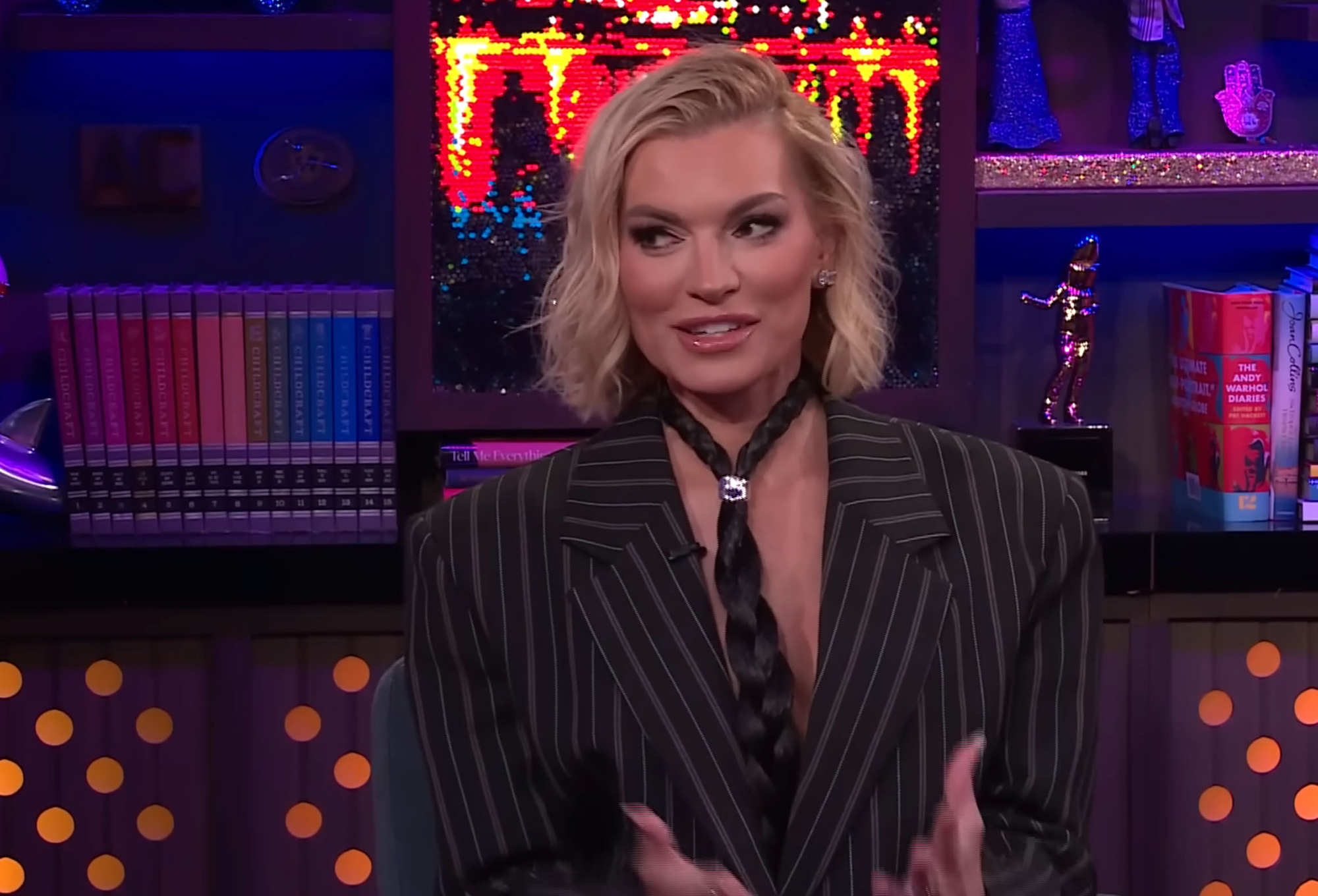 Lindsay Hubbard in a pinstripe blazer and braided tie.