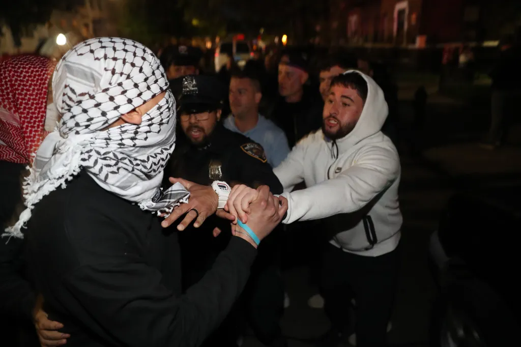Police and protesters supporting Israel and Palestine clash near Young Israel Synagogue of Midwood during protest of "Land Sale" event and Israel supporters in Brooklyn. Some of the protesters on both sides got arrested