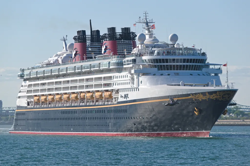 The Disney Magic cruise ship on the water.