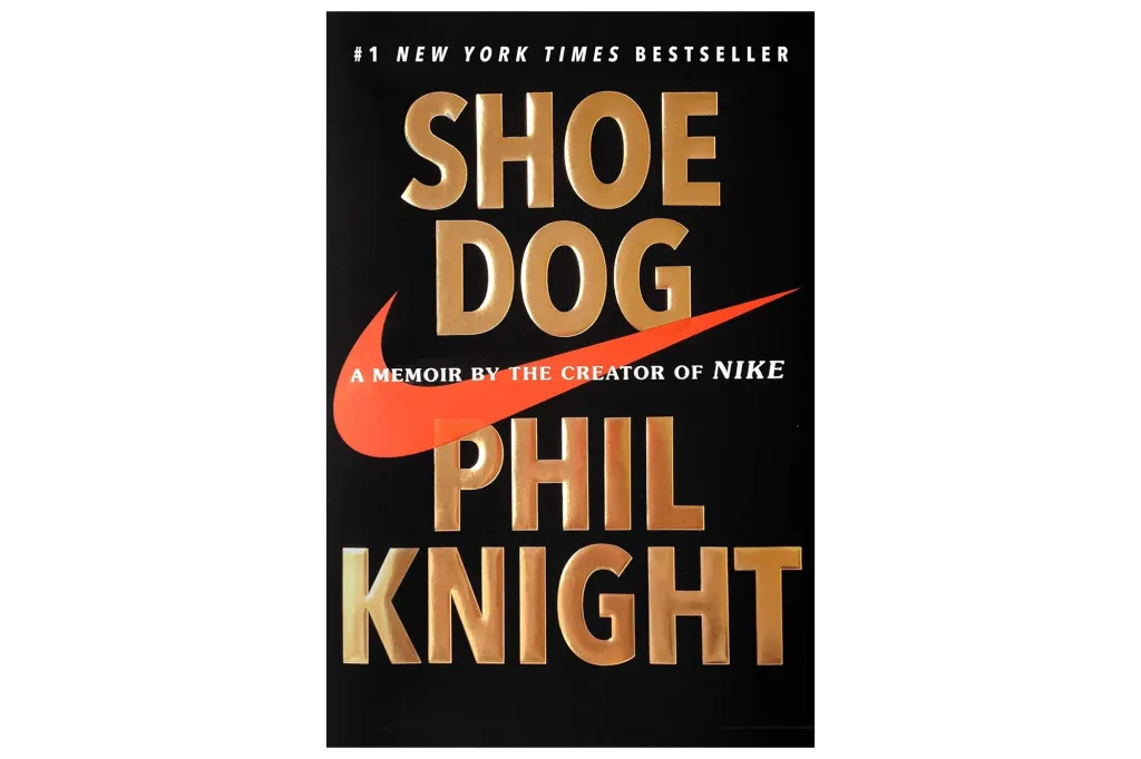 Book cover for "Shoe Dog: A Memoir by the Creator of Nike" by Phil Knight.
