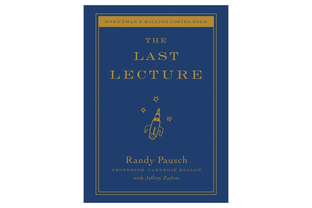 Book cover for "The Last Lecture" by Randy Pausch, featuring a golden rocket and stars on a blue background.