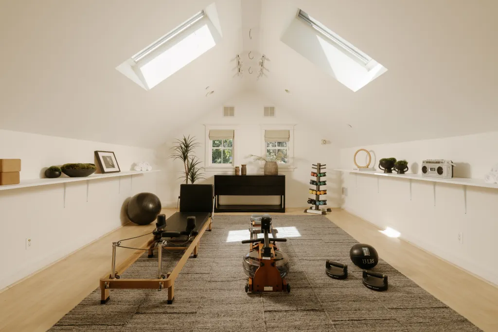 An attic currently designed as a gym.
