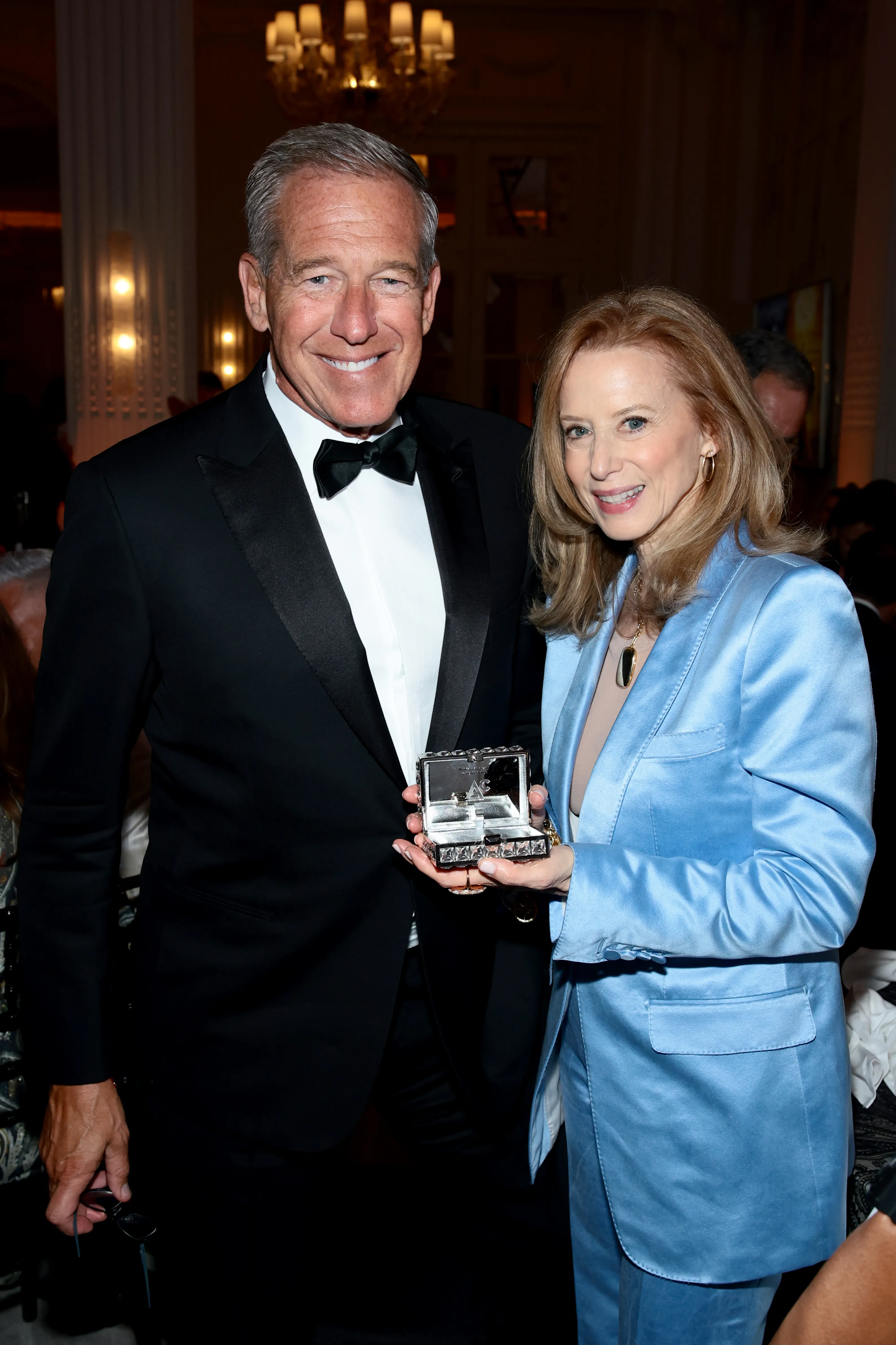Brian Williams and Monica Rich Kosann